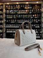 COACH MINI ROWAN CROSSBODY BAG IN BLOCKED SIGNATURE LEATHER