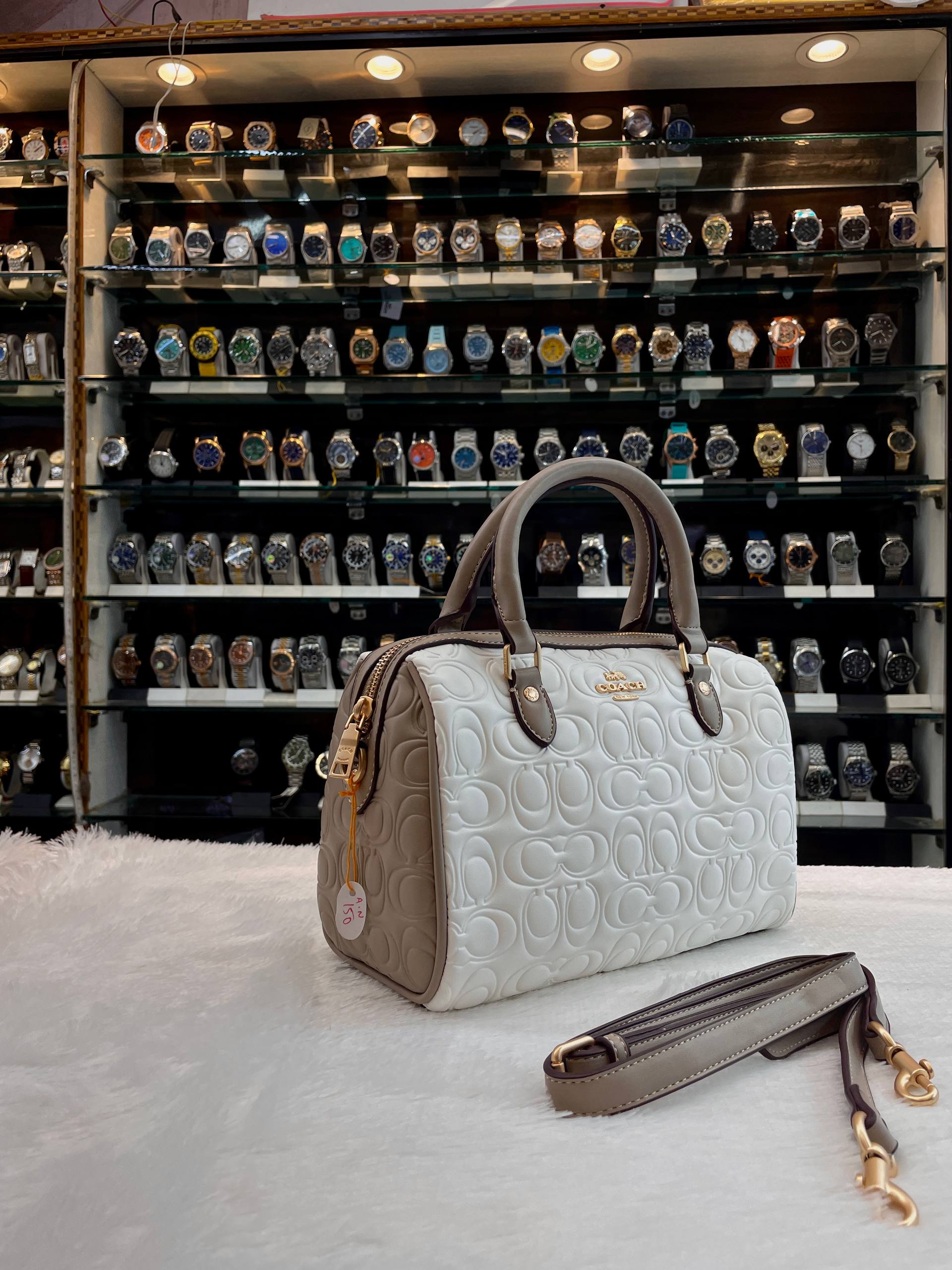 COACH MINI ROWAN CROSSBODY BAG IN BLOCKED SIGNATURE LEATHER