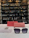 Miu Miu black oversized square sunglasses for girls front view