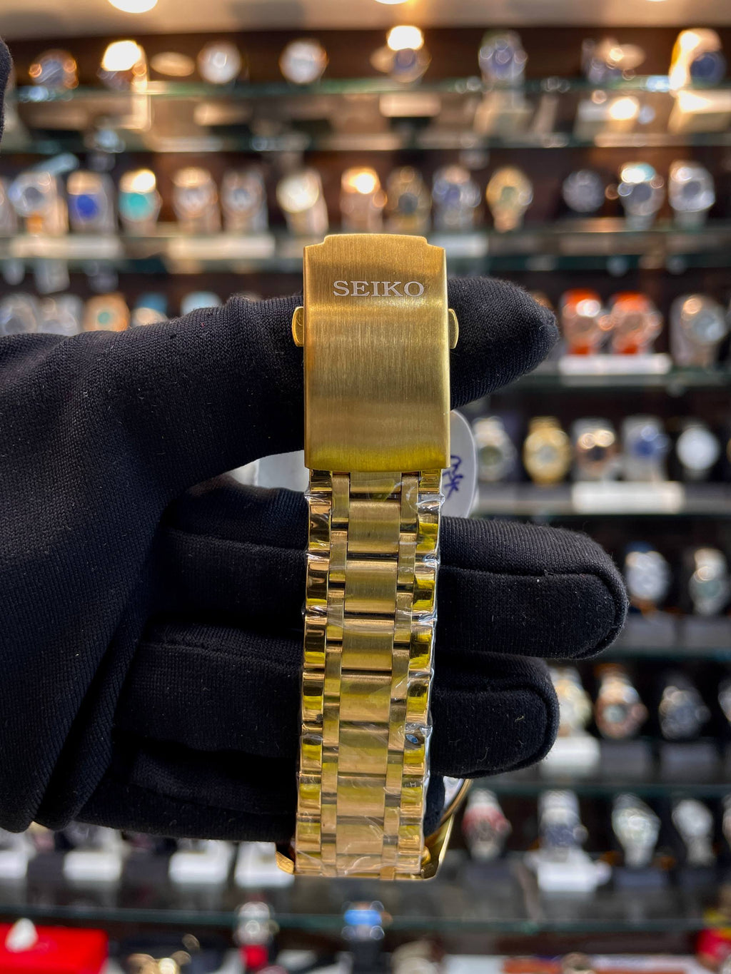 Seiko open heart automatic black dial strap detail