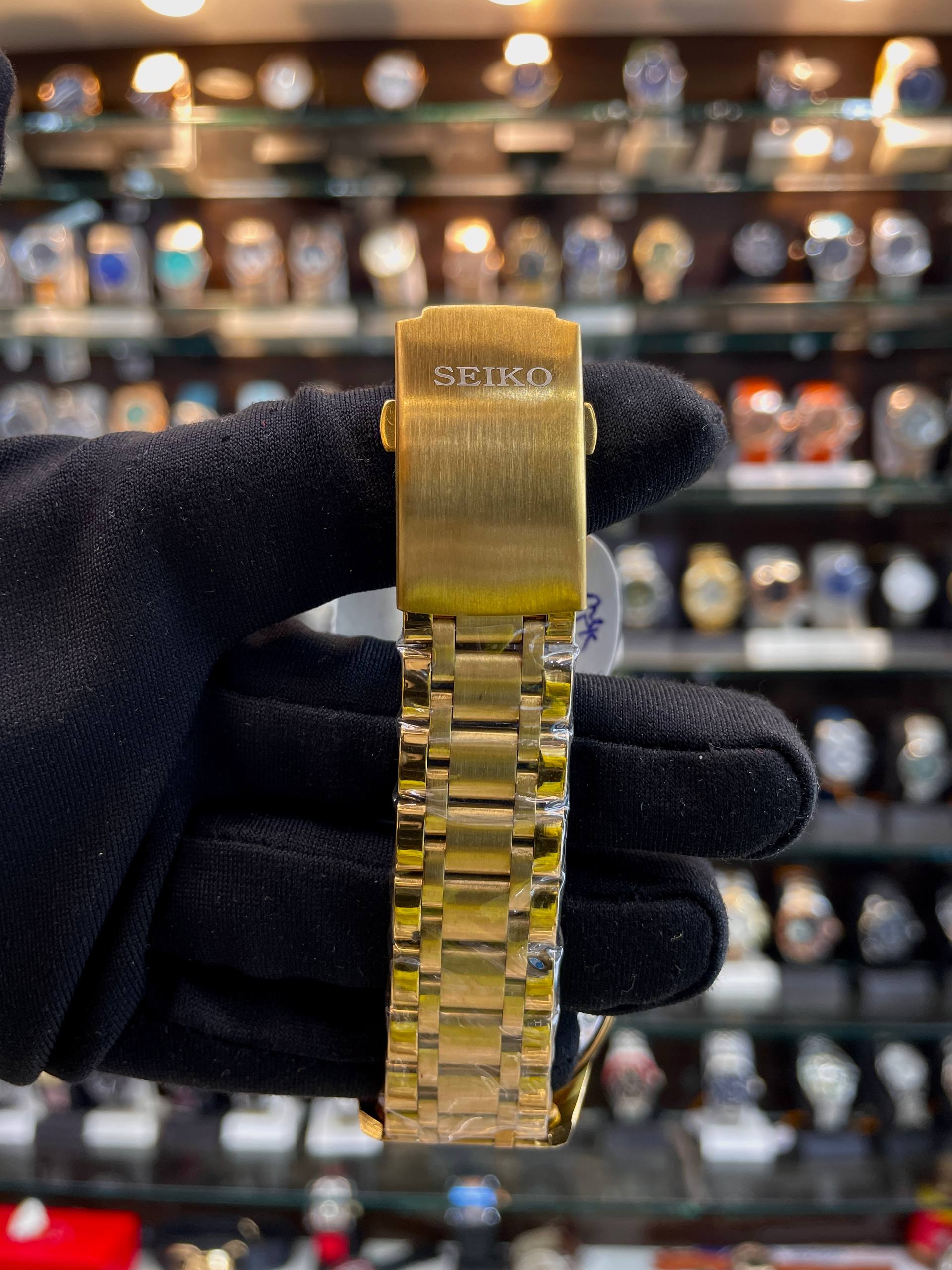 Seiko open heart automatic black dial strap detail