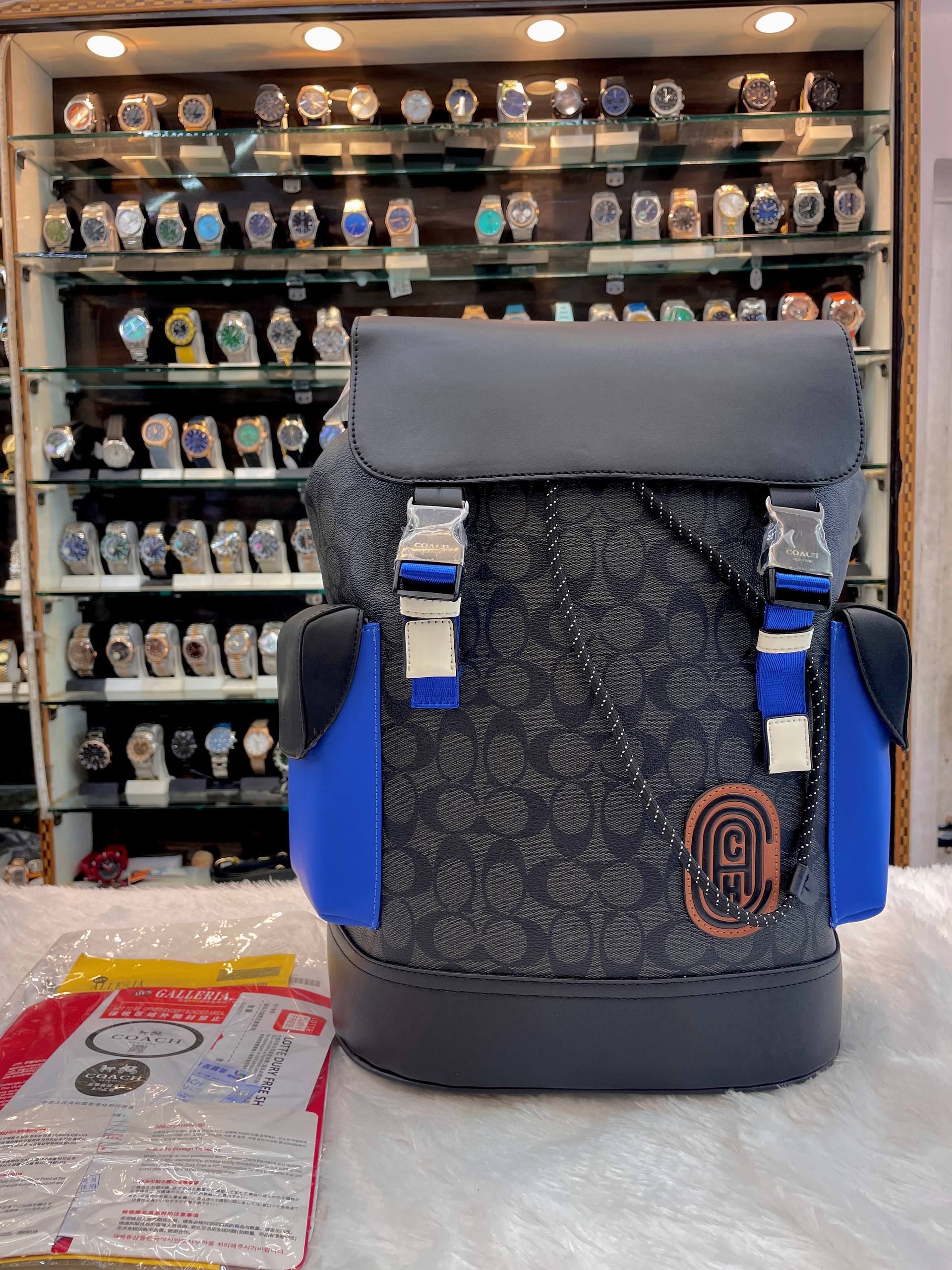 COACH RIVINGTON BACKPACK IN SIGNATURE CANVAS WITH COACH PATCH
