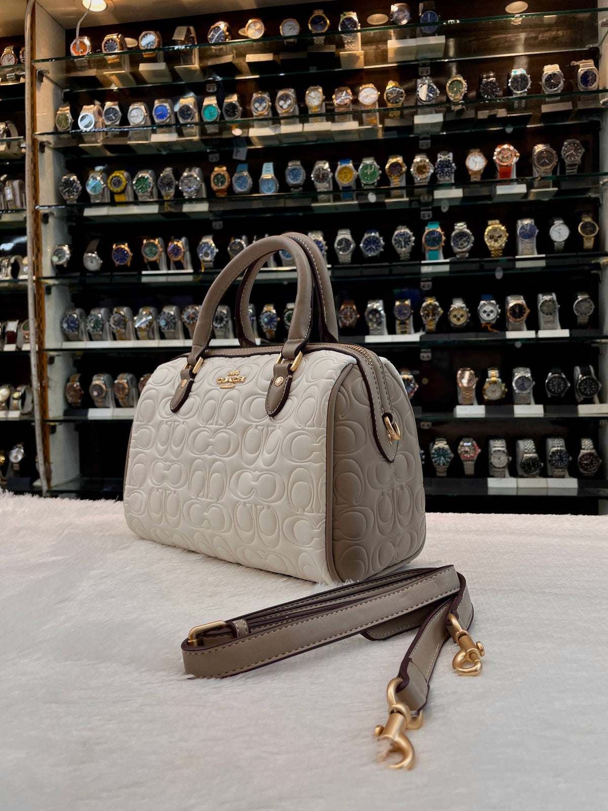 COACH MINI ROWAN CROSSBODY BAG IN BLOCKED SIGNATURE LEATHER
