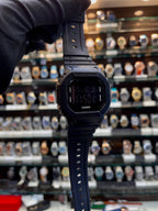 Casio G-Shock DW-5600BB-1 digital watch close up