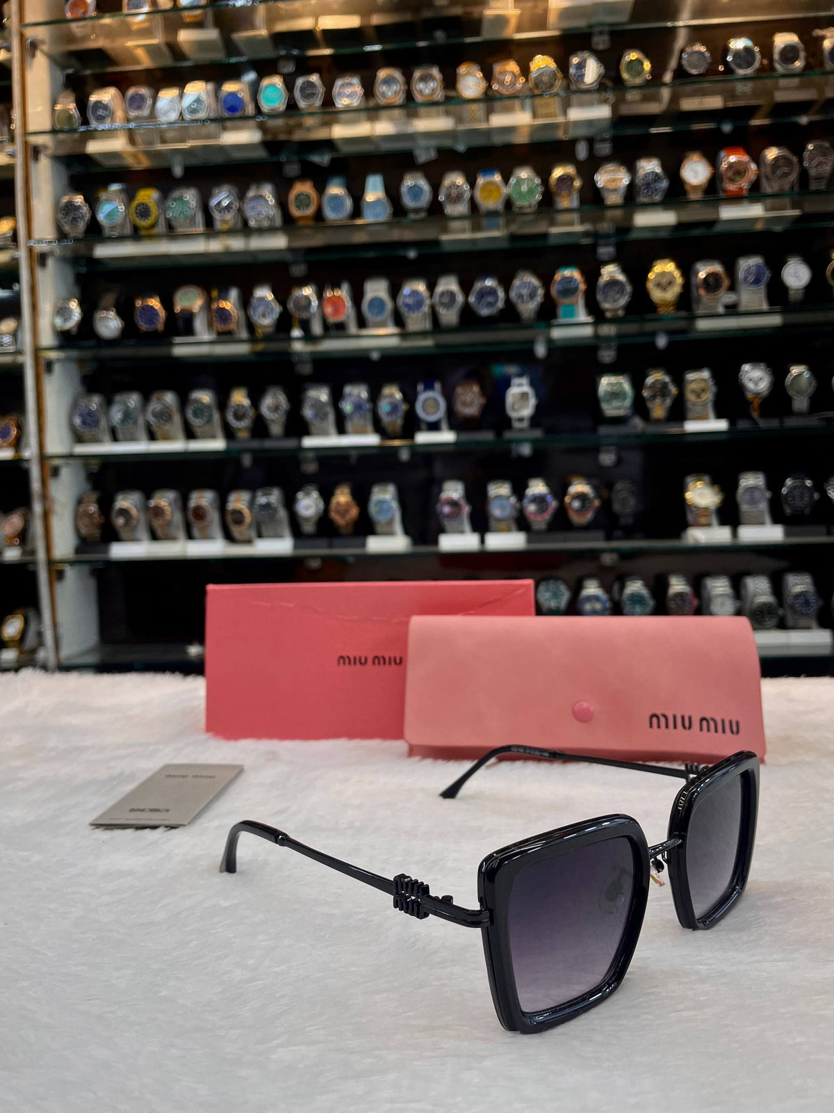 Miu Miu black oversized girls sunglasses side view