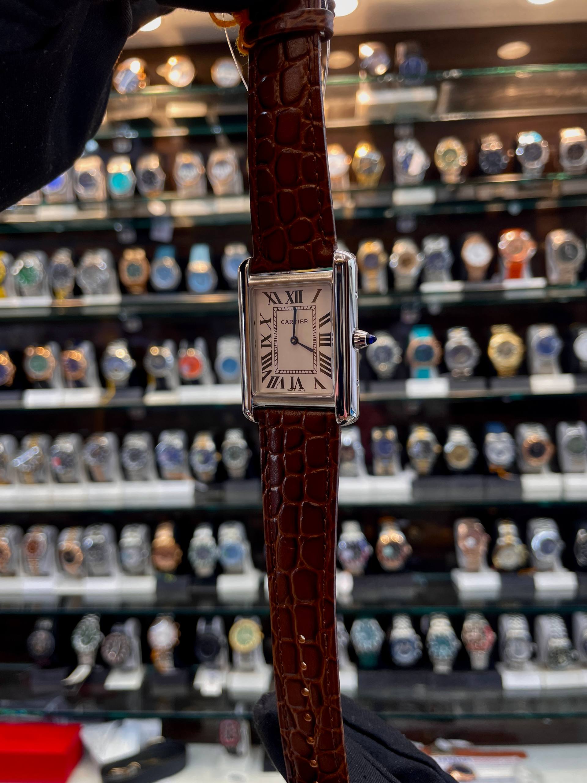 Cartier Tank brown men's watch side view