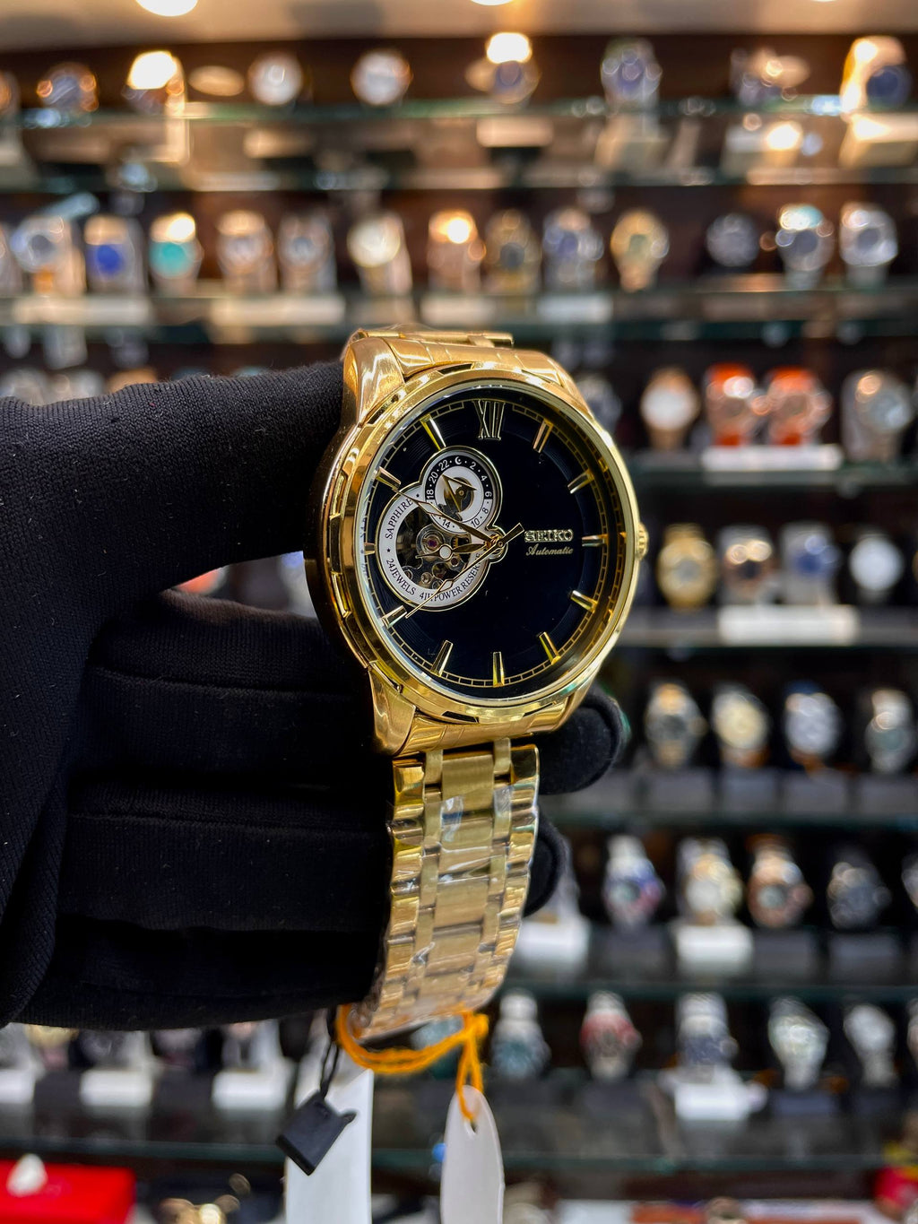 Seiko open heart black dial 24 hour watch close up