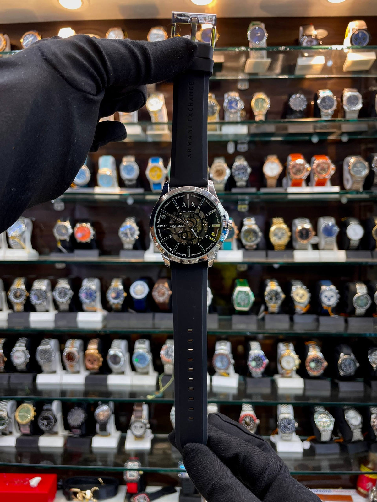 Armani Exchange black silicone watch front view