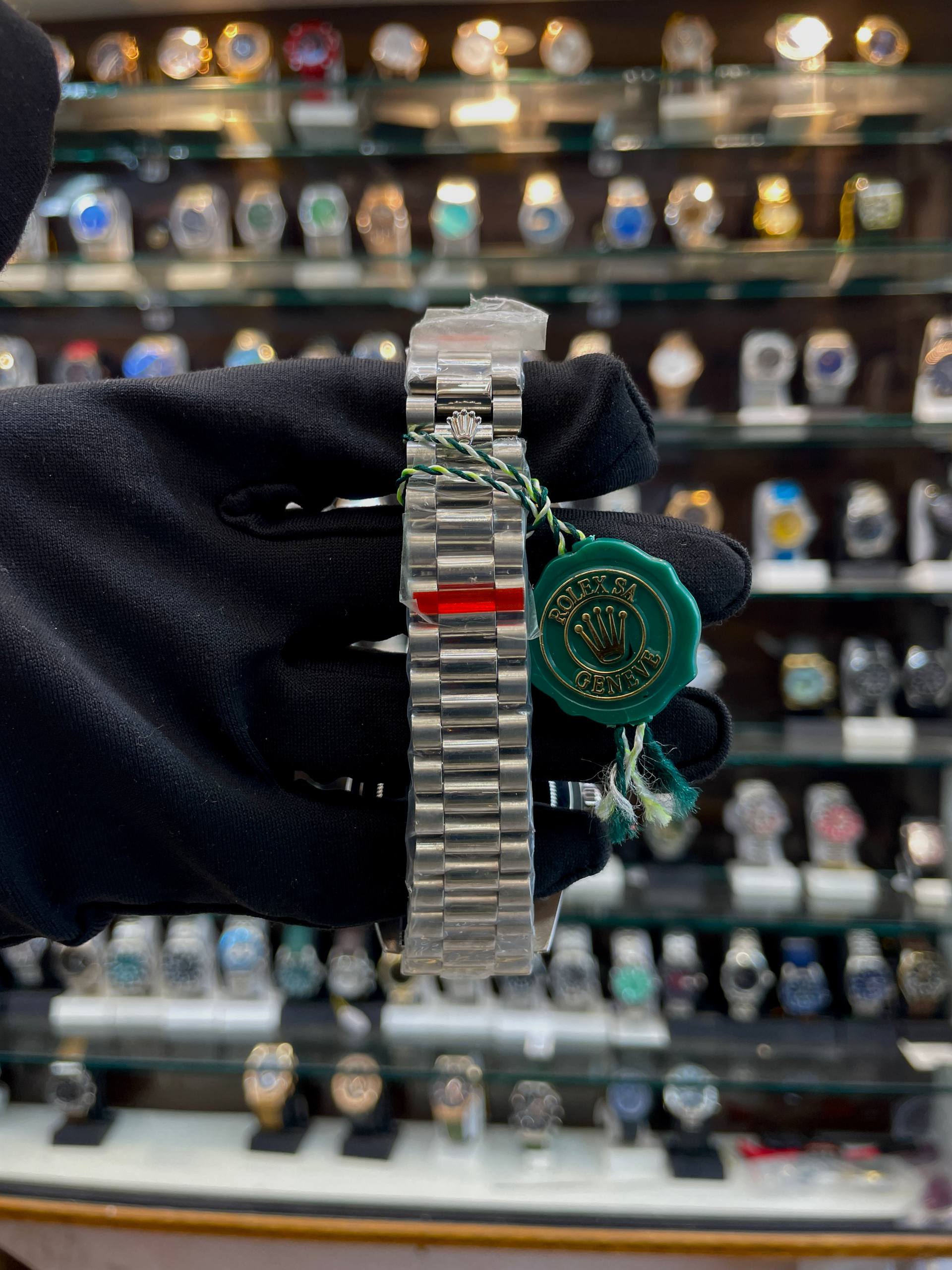 ROLEX DAY-DATE 40 MM, PLATINUM AND DIAMOND-SET BEZLE IN SEMI-ETA