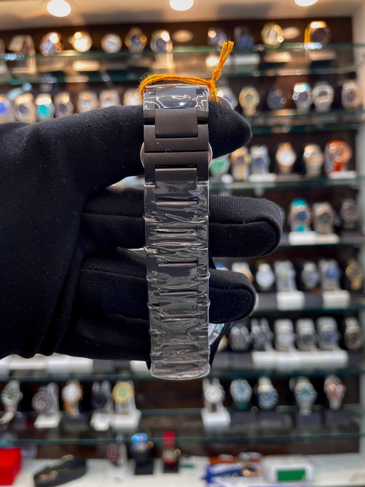 Fossil brown glass dial men's watch strap view