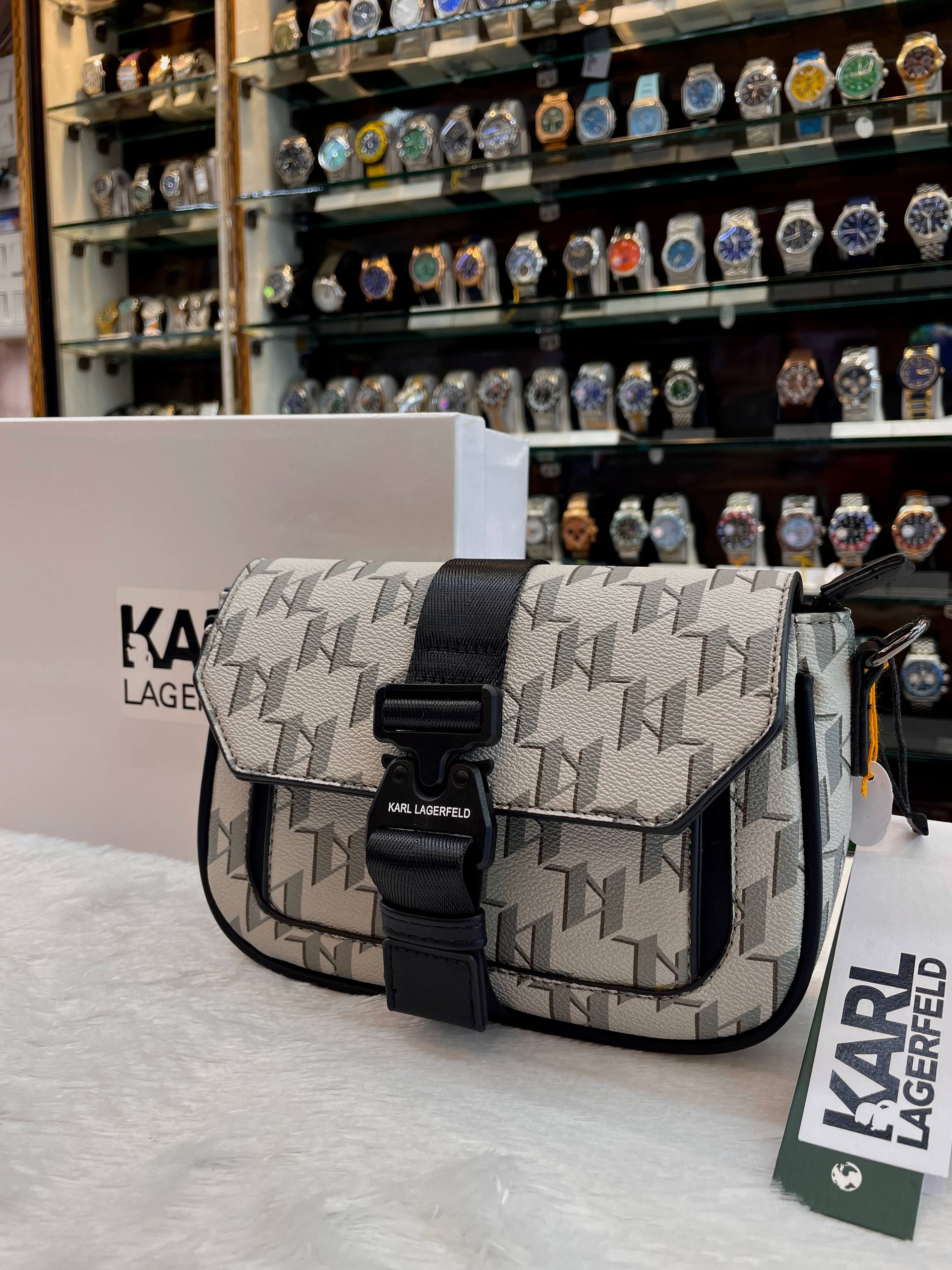 KARL LAGERFELD GEOMETRIC MONOGRAM BUCKLE CROSSBODY BAG