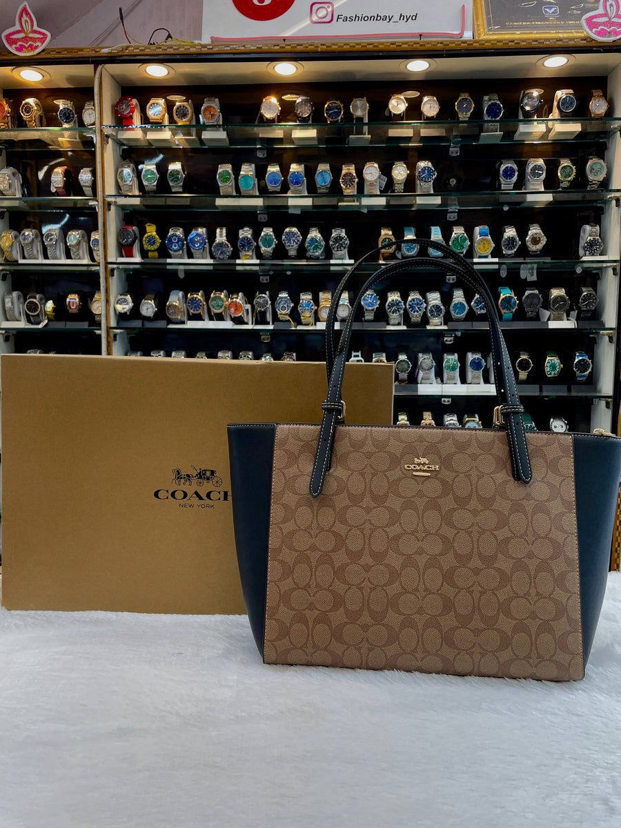 COACH MOLLIE TOTE IN SIGNATURE CANVAS WITH BLACK LEATHER MASTER PIECE 🤩