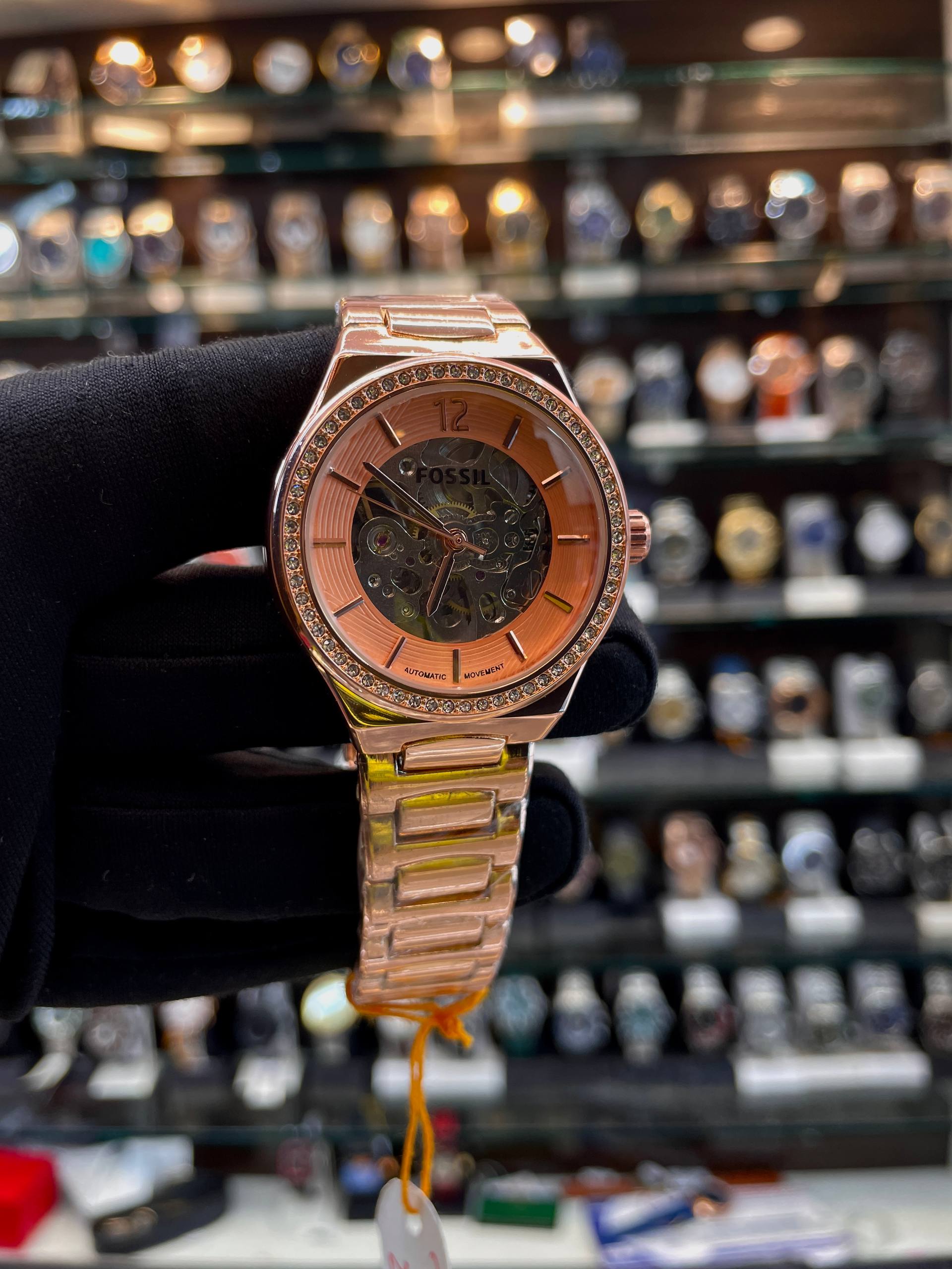 Fossil automatic rose gold watch close up
