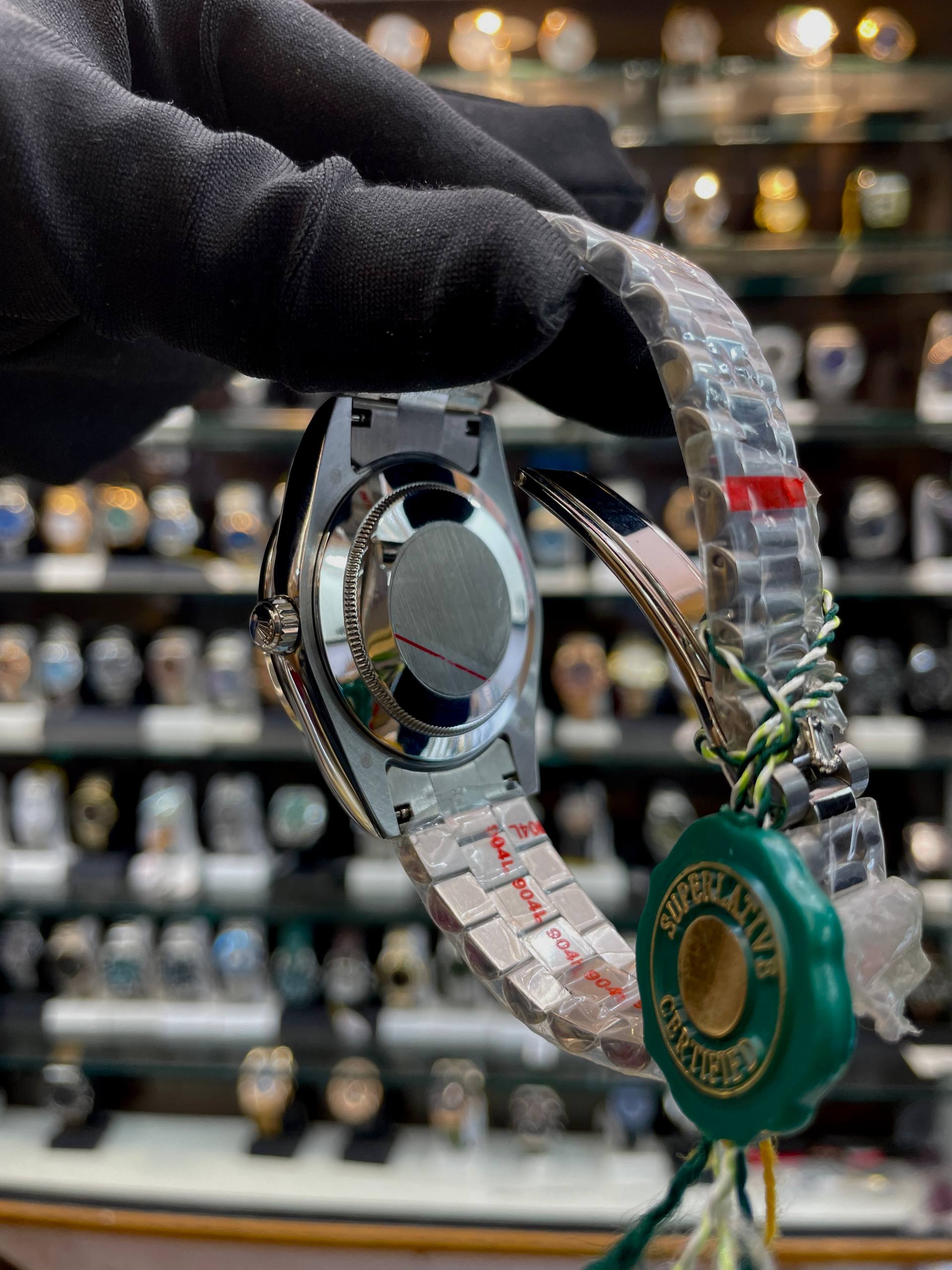 ROLEX DAY-DATE 40 MM, PLATINUM AND DIAMOND-SET BEZLE IN SEMI-ETA