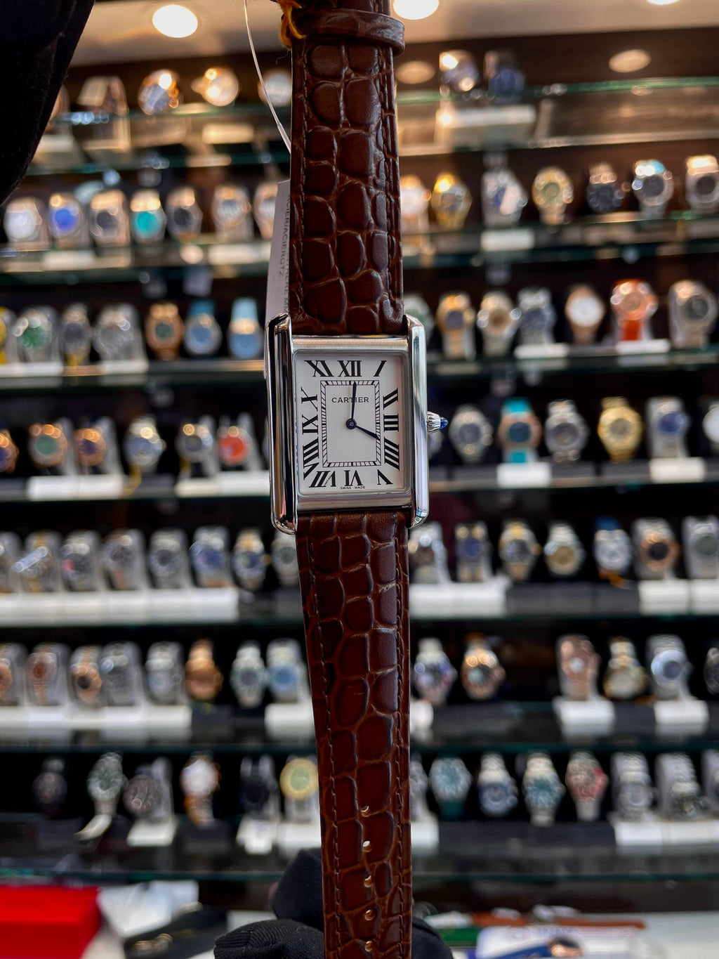 Cartier Tank Masterpiece brown watch close up