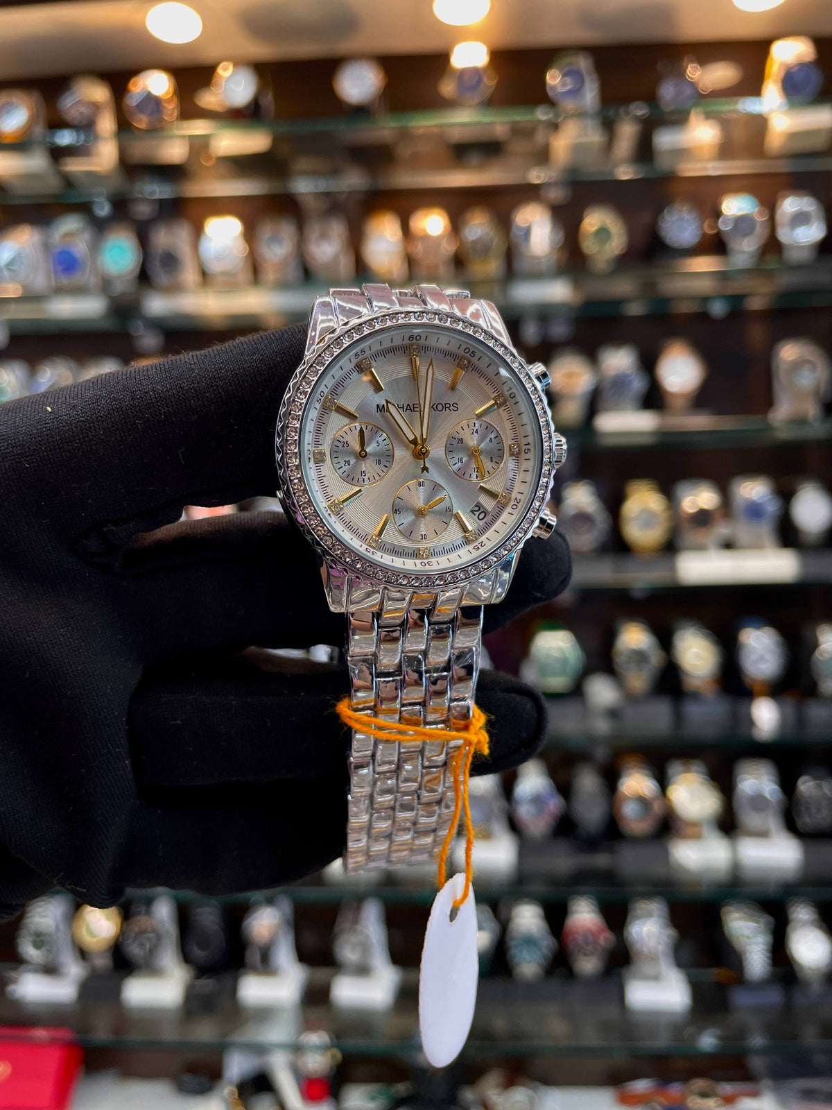 Michael Kors MK chronograph silver dial white watch for girls front view