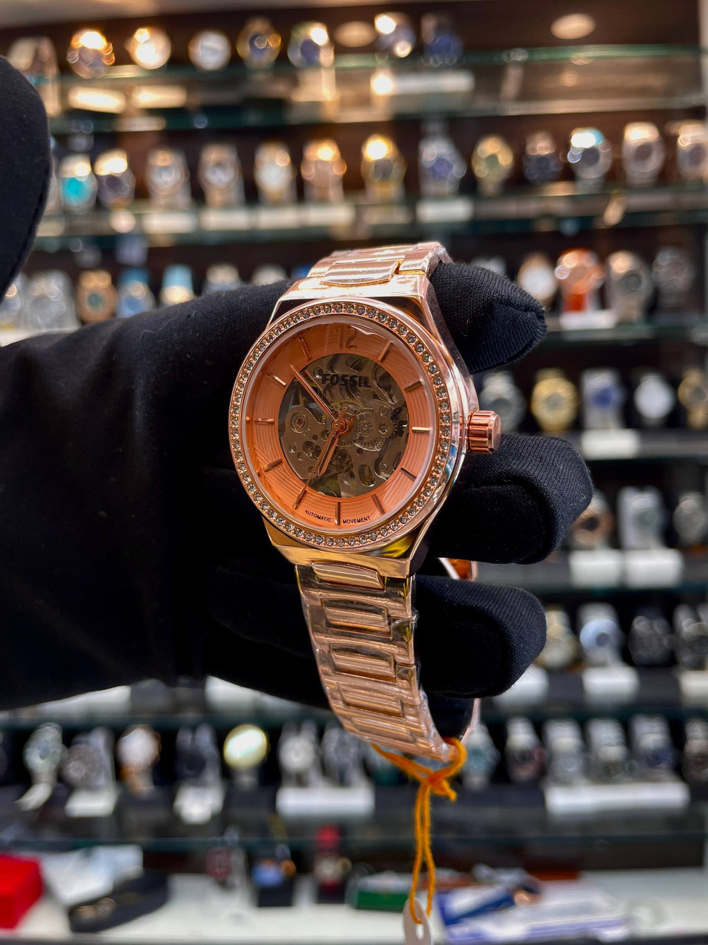 Fossil rose gold automatic girls watch side view
