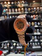 Fossil rose gold automatic girls watch side view