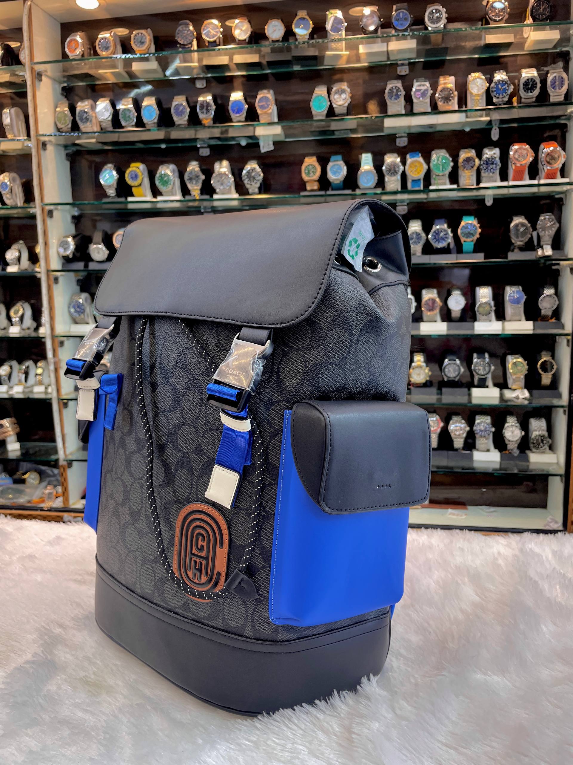 COACH RIVINGTON BACKPACK IN SIGNATURE CANVAS WITH COACH PATCH