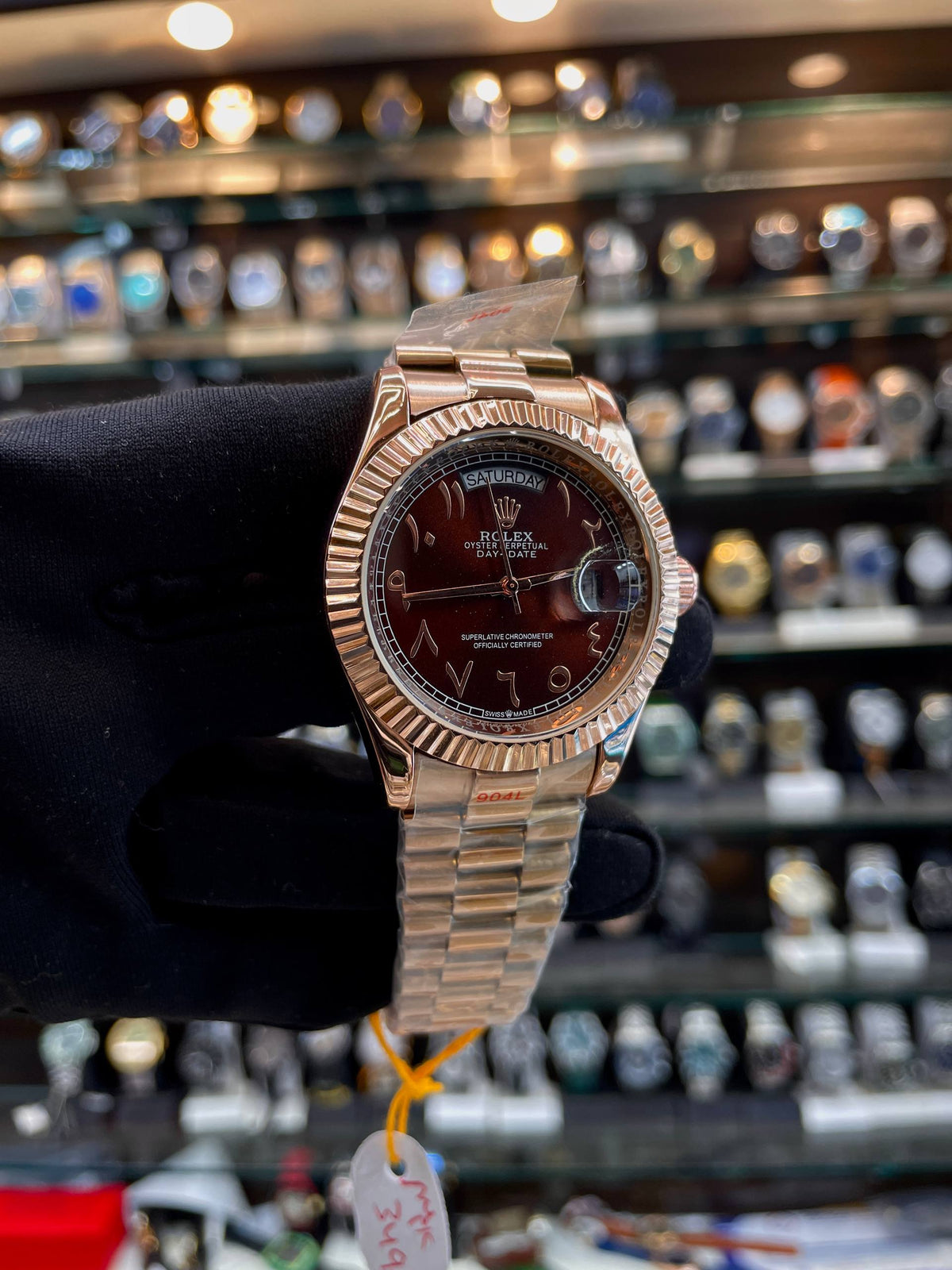 Rolex Arabic dial brown men's watch angled view