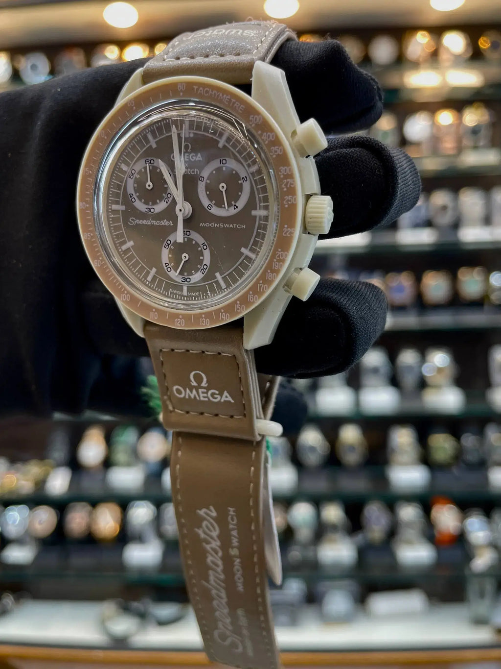 Omega swatch now under budget brown