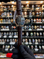 Tissot Powermatic brown dial watch close up