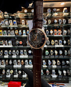 Tissot Chemin des Tourelles brown watch angled view
