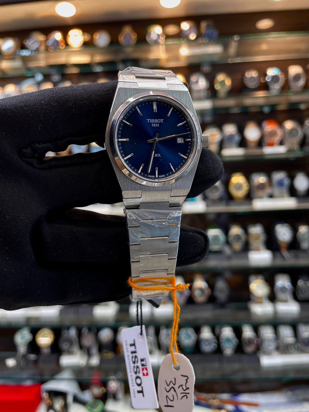 Tissot PRX blue dial watch detail