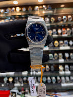 Tissot PRX blue dial watch detail