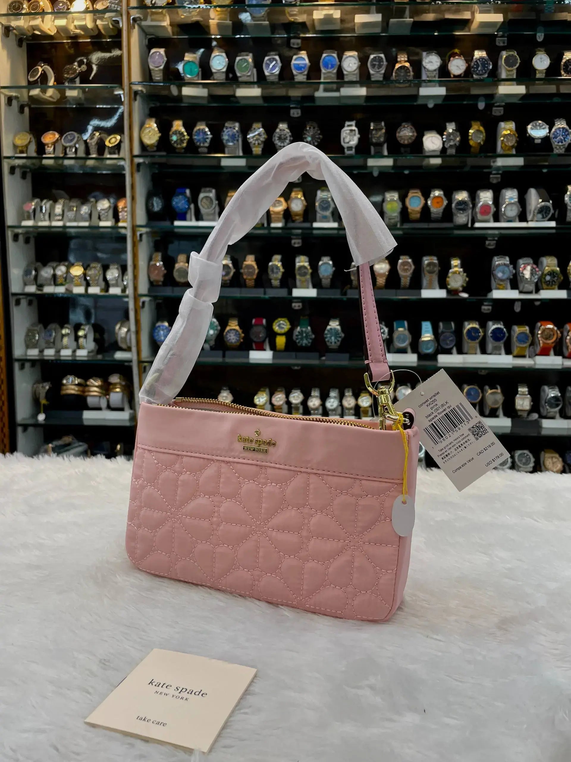 Kate spade new york pink flower quilted sling bag
